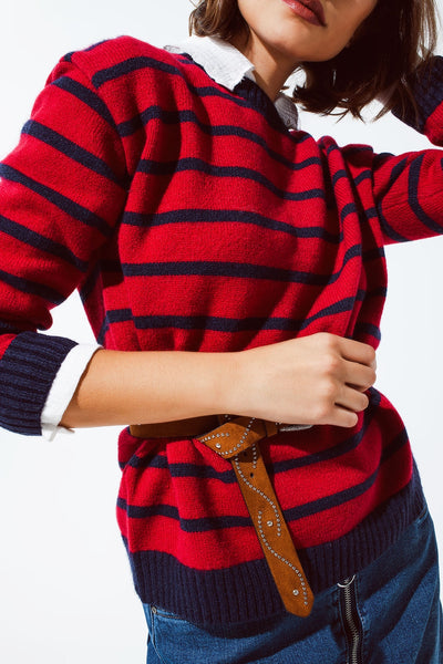 Red sweater with blue stripes and a white crew neck