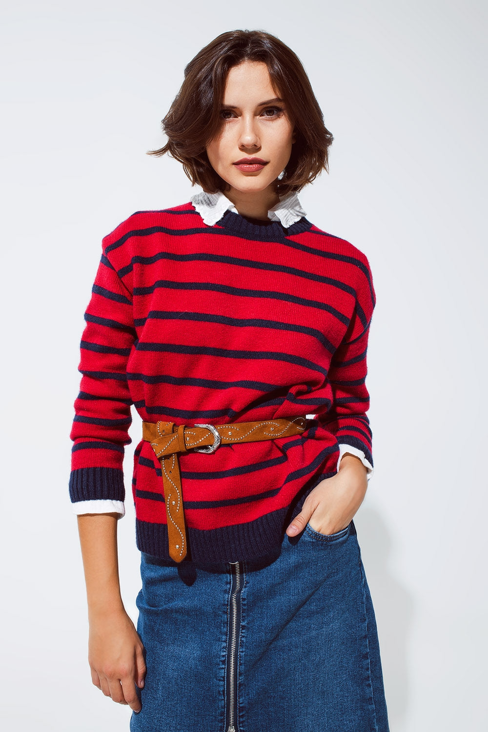 Q2 Red sweater with blue stripes and a white crew neck