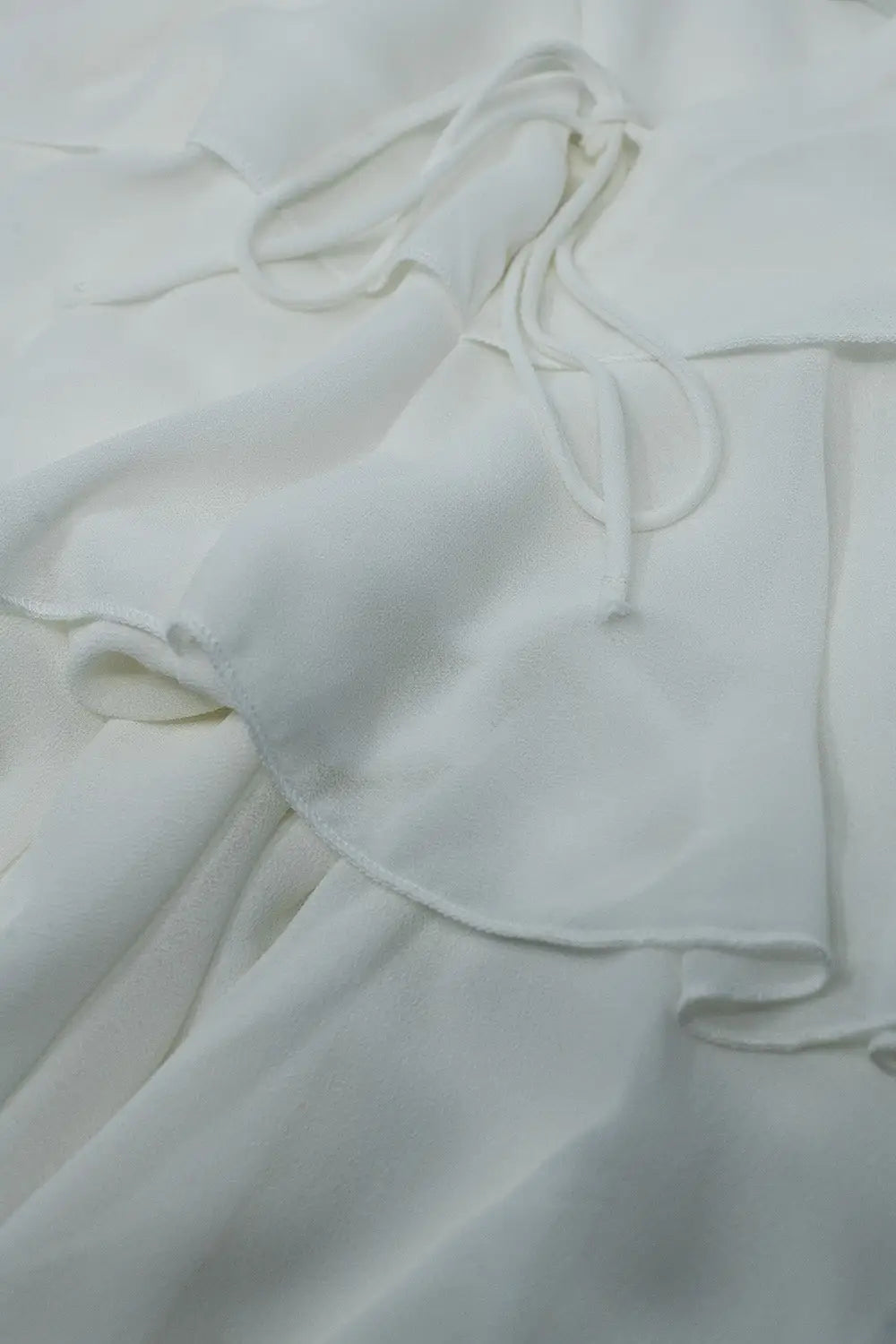 Top à volants et fines bretelles en blanc - Tops