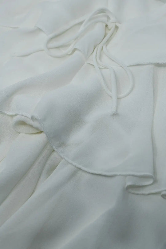 Top à volants et fines bretelles en blanc - Tops