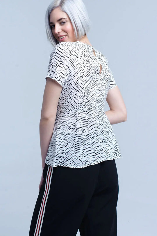 Top blanc à pois avec ourlet à volants - Tee-Shirt