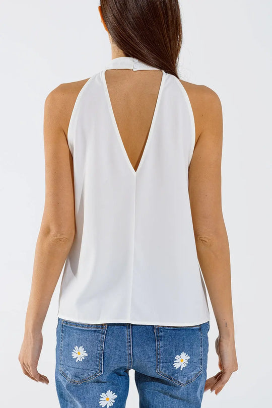 Top blanc sans manches avec détails à volants et col montant - Tops