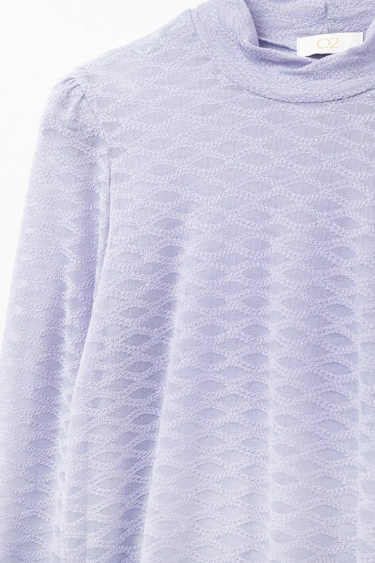 Top en dentelle lilas avec col montant et détails des poignets - Tops
