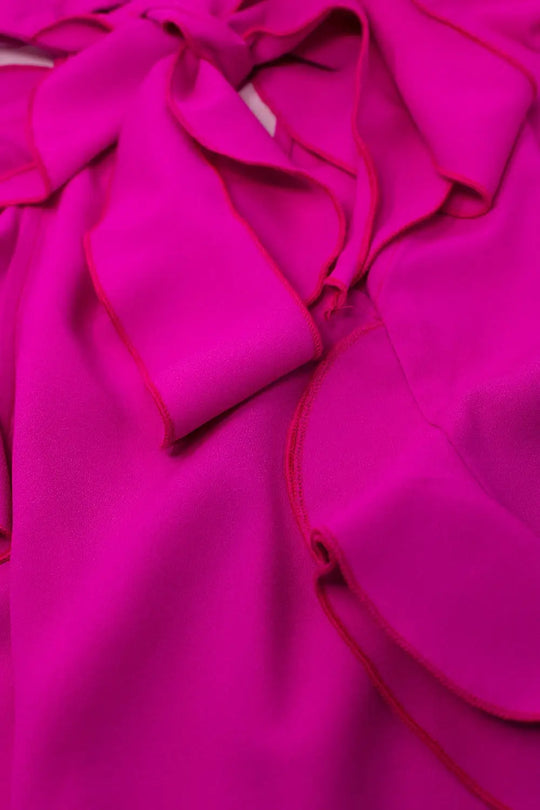 Top rose sans manches avec détails à volants et col montant - Tops