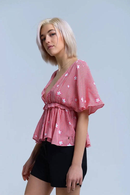 Top rouge avec des étoiles et des volants - Tops