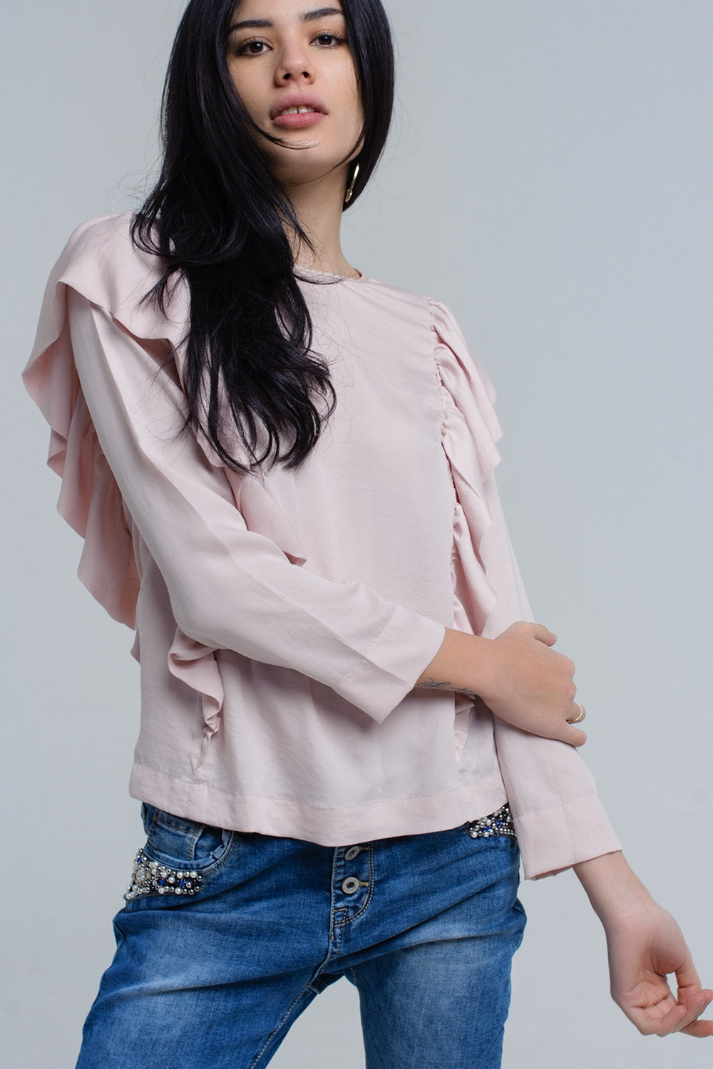 Q2 Top with ruffle detail in pale pink