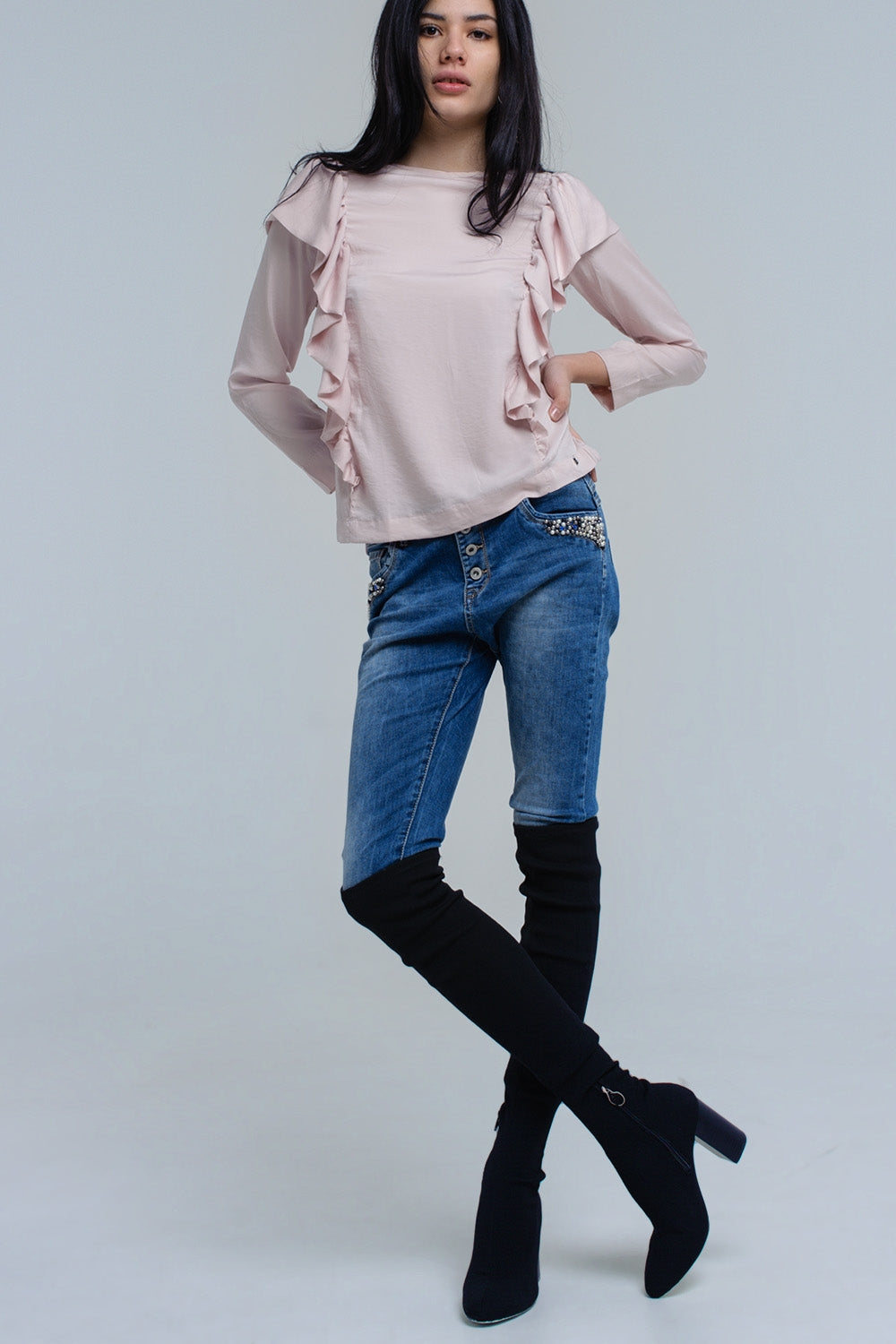 Top with ruffle detail in pale pink