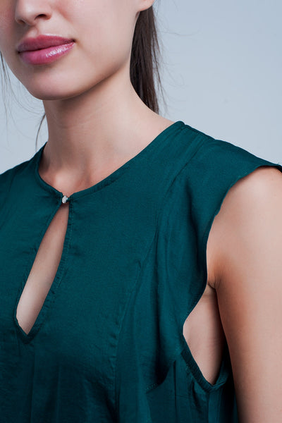 Top with ruffles in dark green