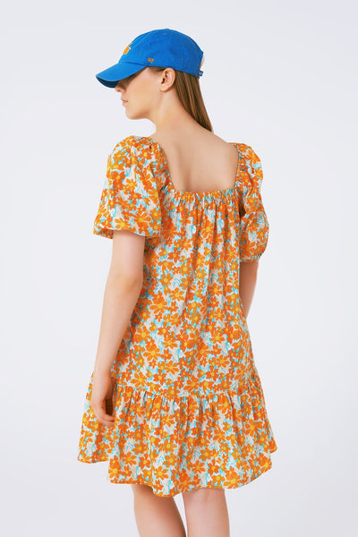Vestido corto amplio estampado de flores y mangas abullonadas
