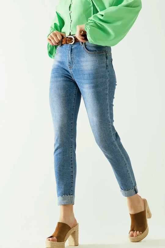 Washed effect push-up jeans with five pockets and hem - Jeans