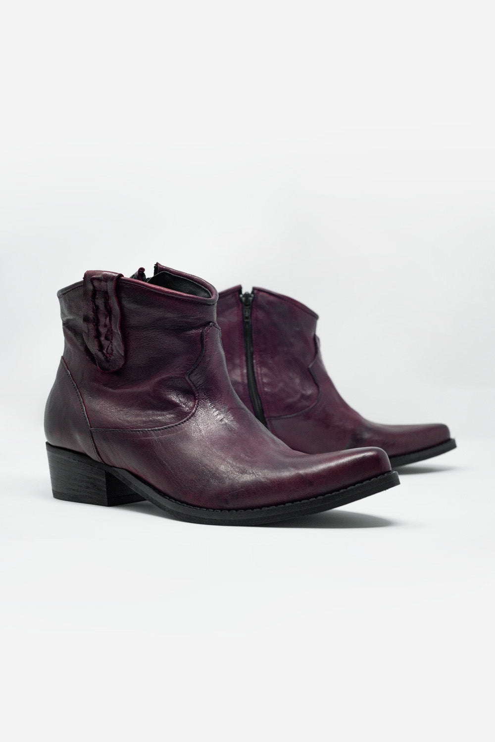 Western sock boots in maroon with detail on the side