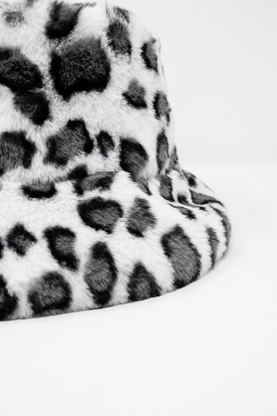 White bucket hat in animal print