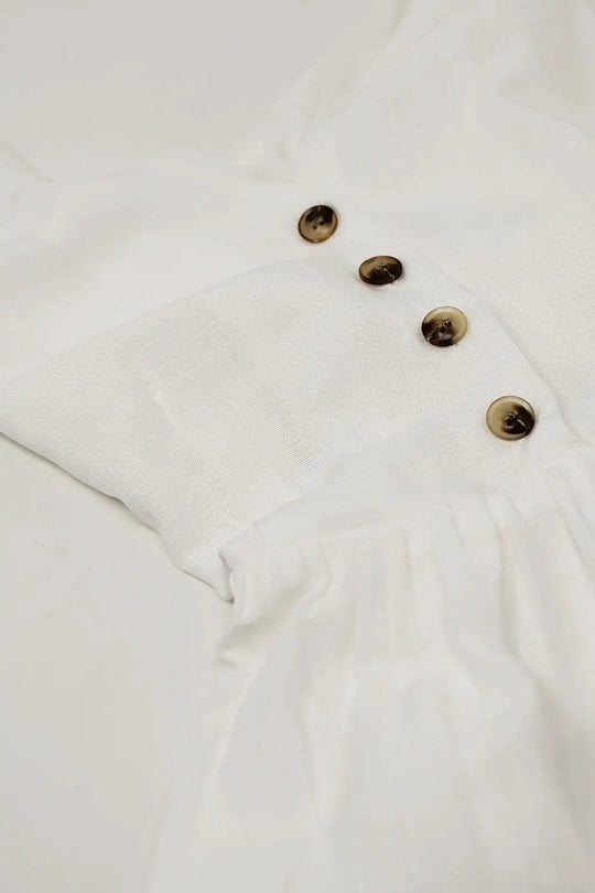 White dress with button detail - Dresses