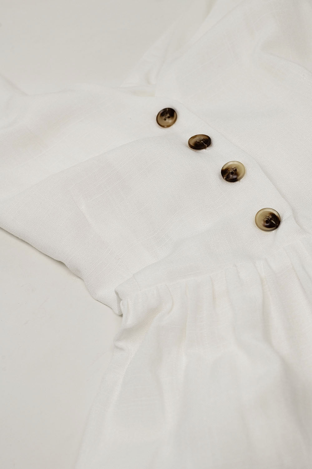 White dress with button detail