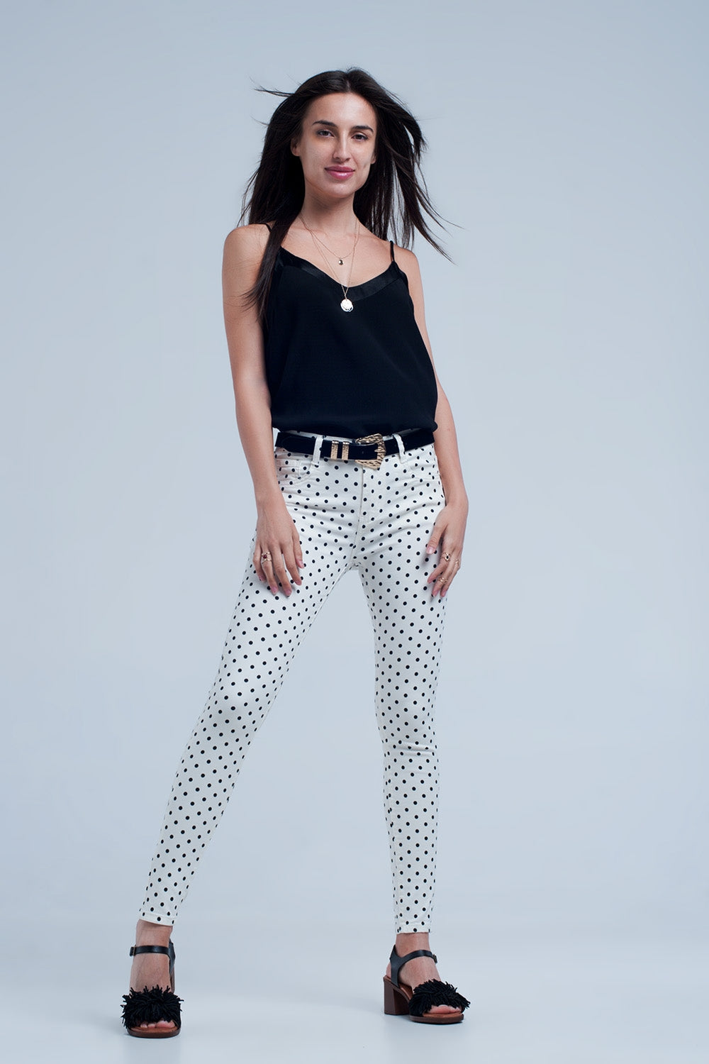 White jeans in polka dots