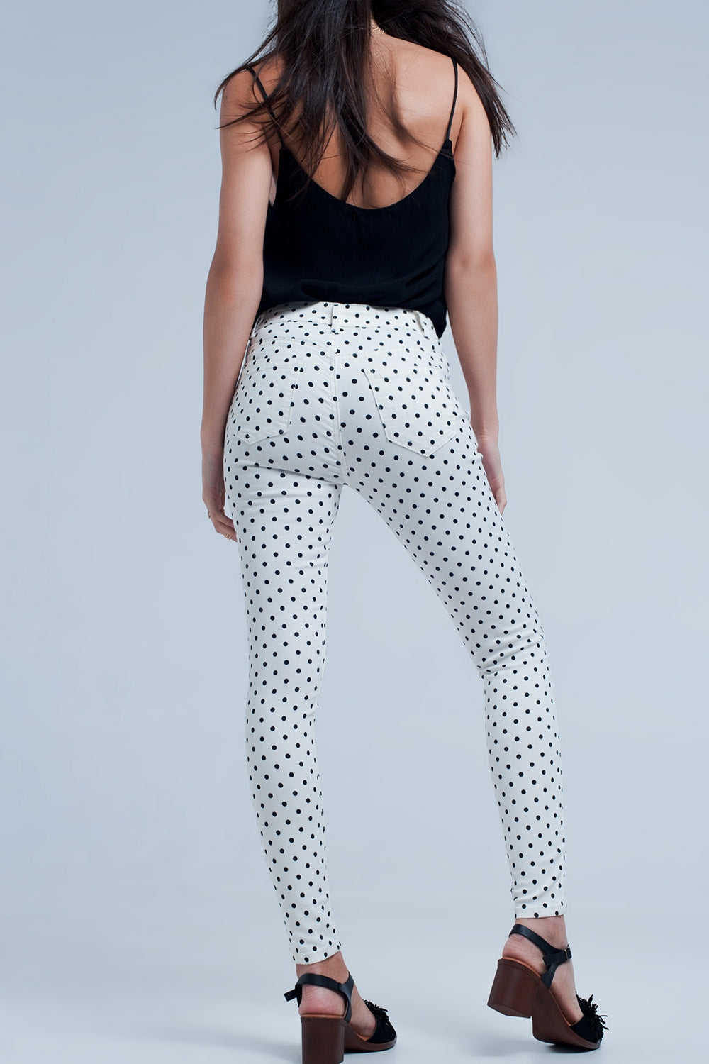 White jeans in polka dots