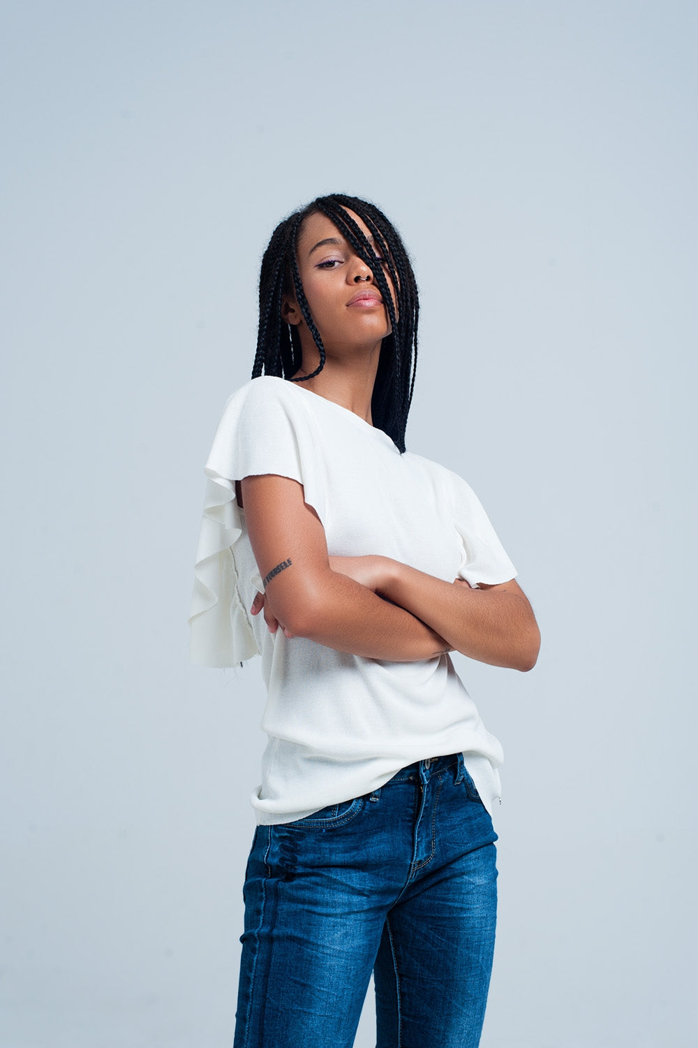 White sweater with ruffles