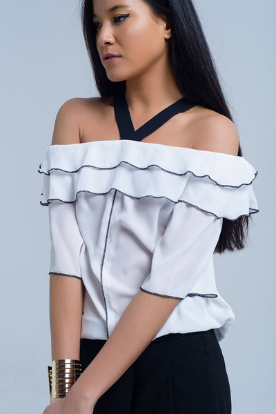 White top with black contrast trim