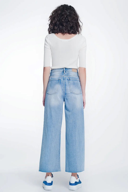 wide leg cropped raw hem jeans in light blue - Jeans