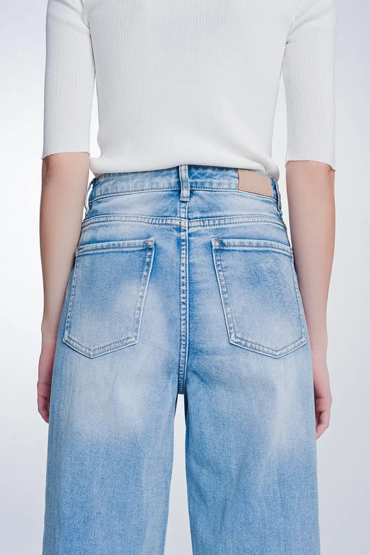wide leg cropped raw hem jeans in light blue - Jeans