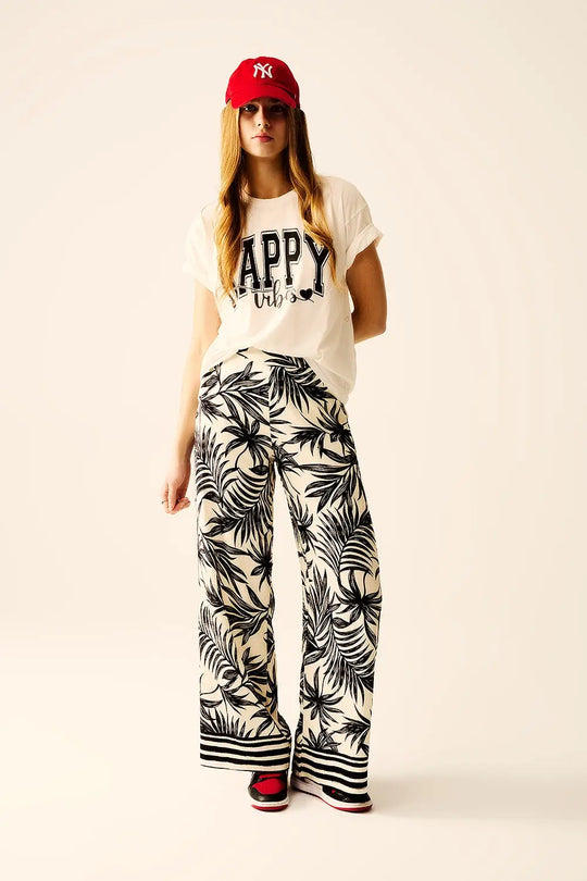 Wide Leg Pants In White With Floral Detail In Black - Pants