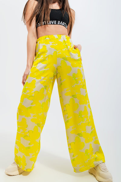 Wide leg trousers in yellow floral