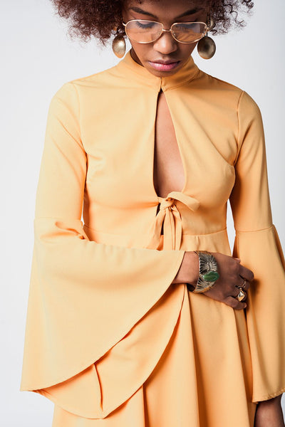 Yellow bell sleeve plunge dress