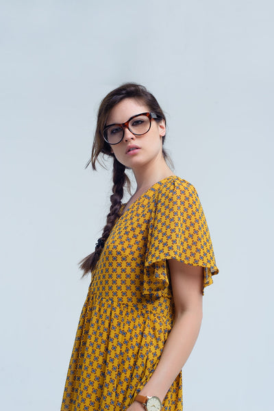 Q2 Yellow dress with flight and geometric pattern