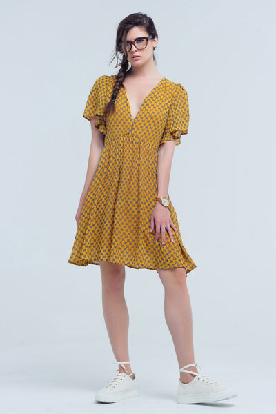 Yellow dress with flight and geometric pattern