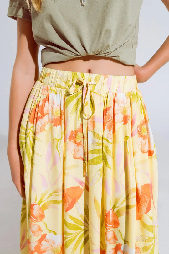 yellow maxi skirt with tropical print - Skirts