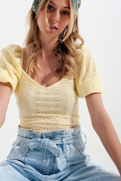 Yellow short top in batiste fabric with puffed sleeves